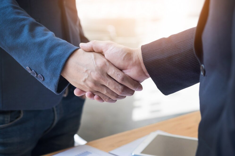 two confident business man shaking hands during meeting office success dealing greeting partner concept 1423 185.jpg